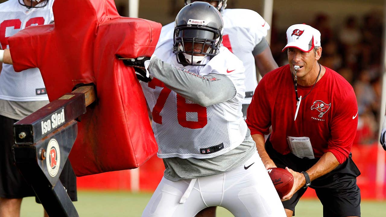 Titans staff grows with hiring of defensive, offensive line coaches